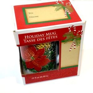 Royal Norfork Christmas cup still in box.Very pretty poinsettia around the cup